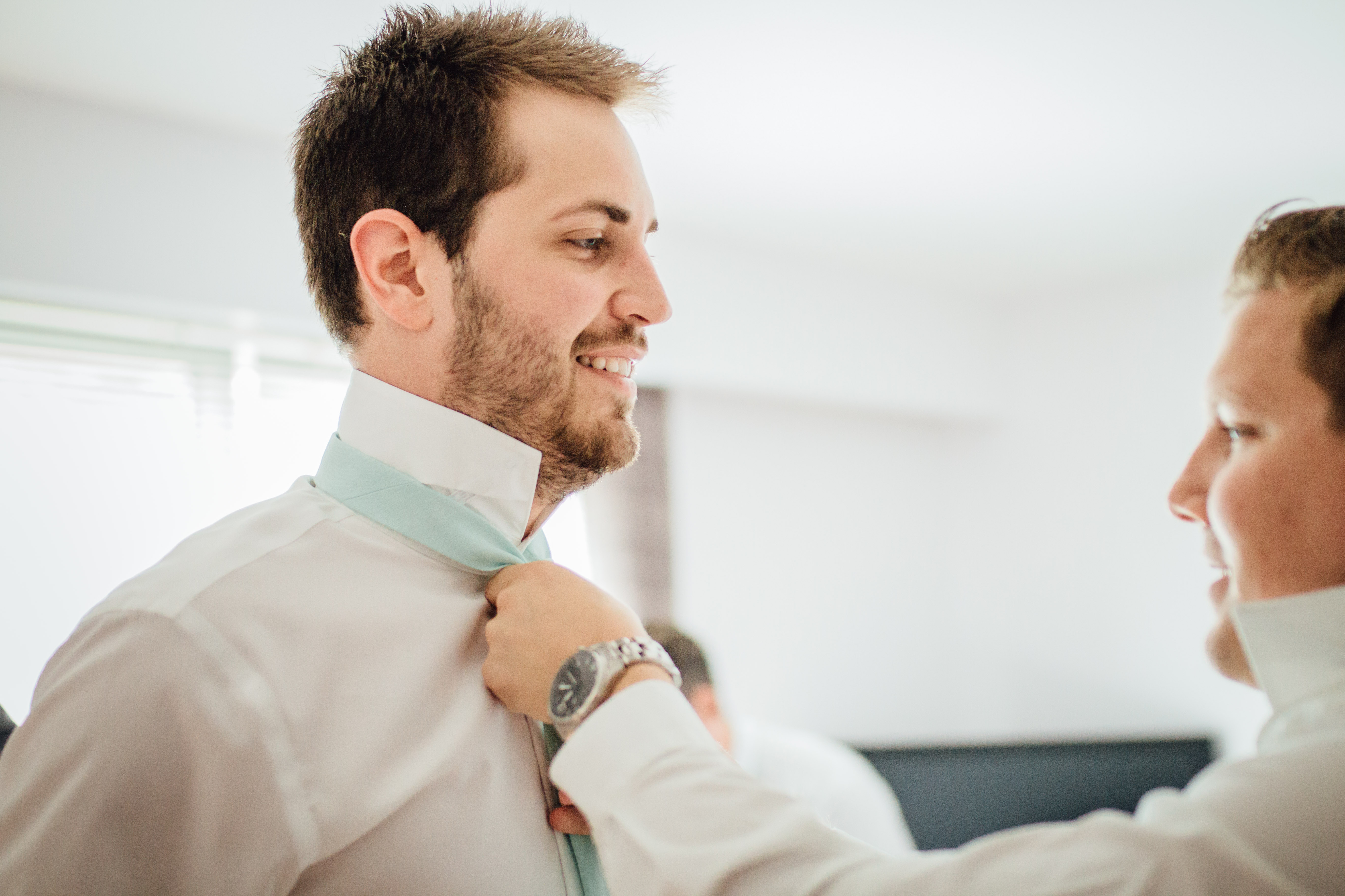 Qualico Family Centre Wedding - groom getting ready