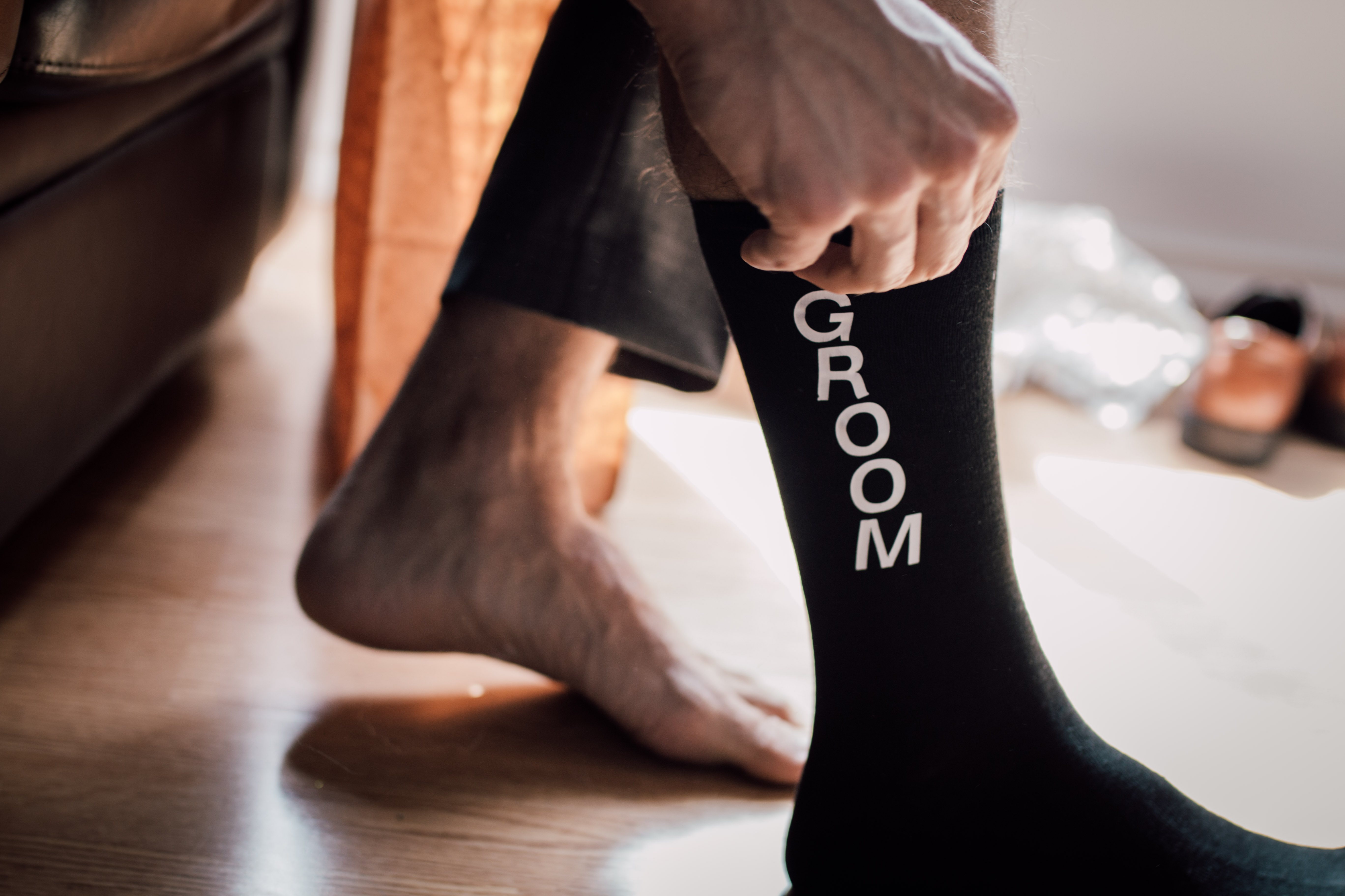 Qualico Family Centre Wedding - groom socks