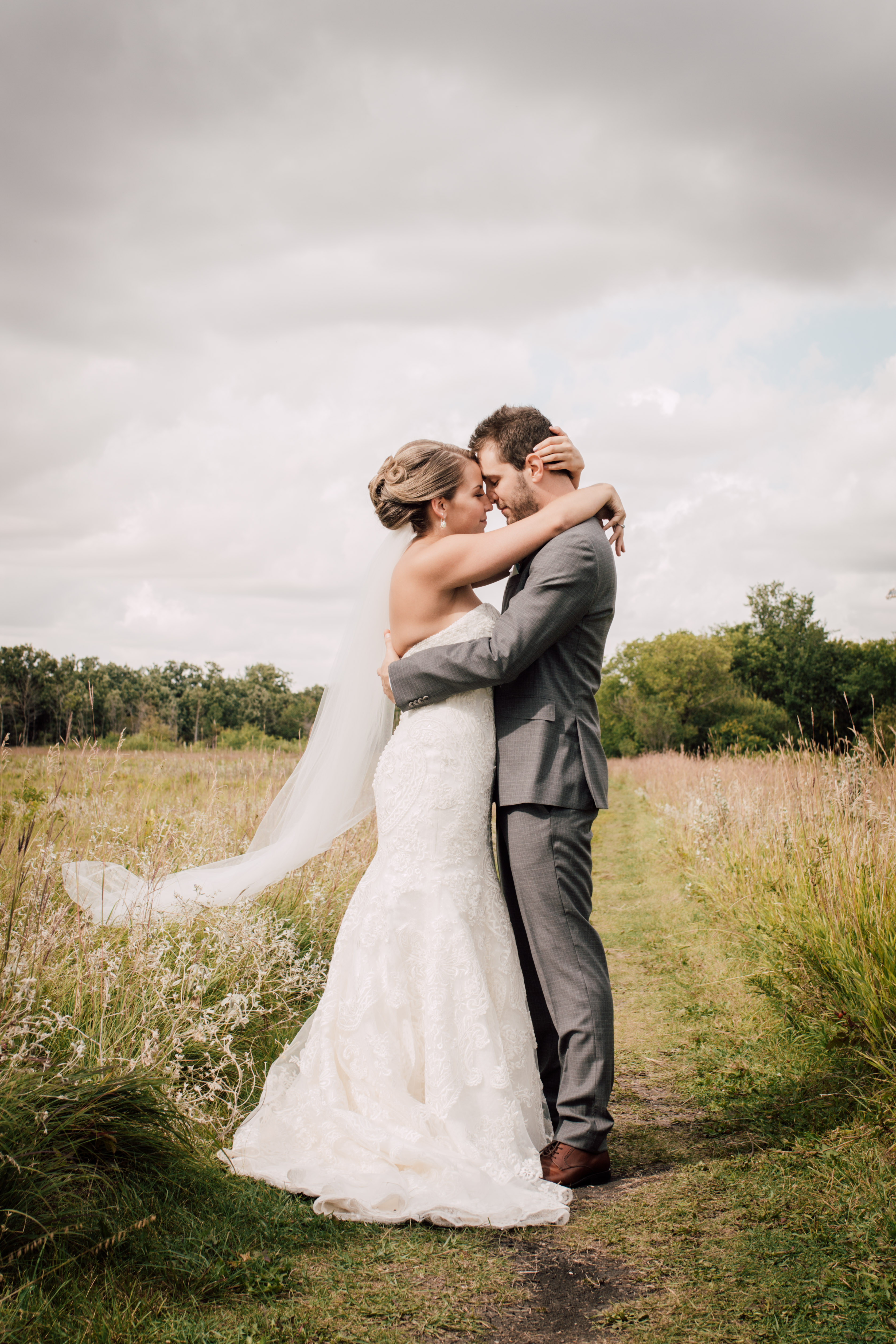 Qualico Family Centre Wedding - bride & groom